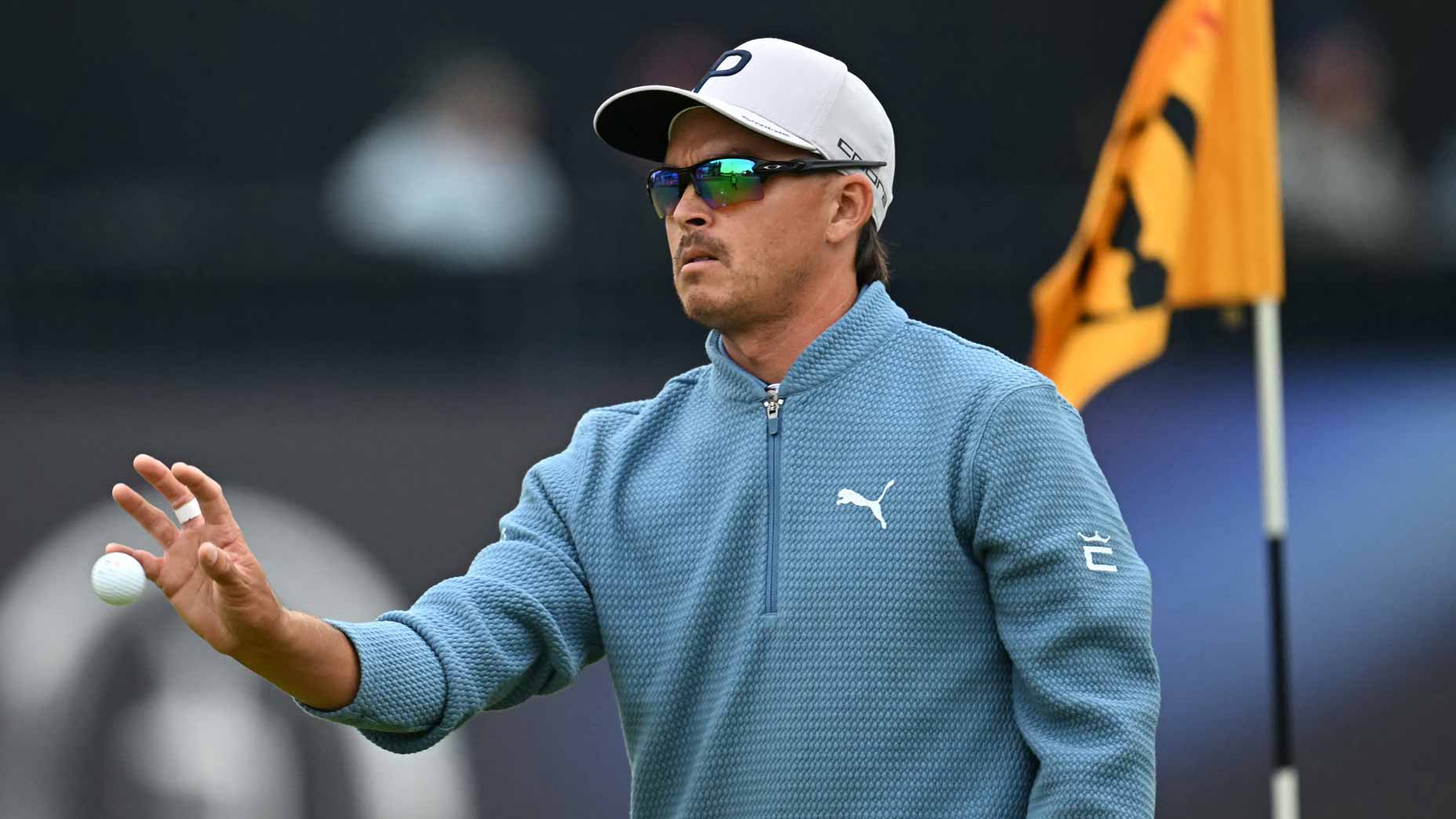 Rickie Fowler catches ball on the 18th hole on the opening day of the 2024 Open Championship at Royal Troon.