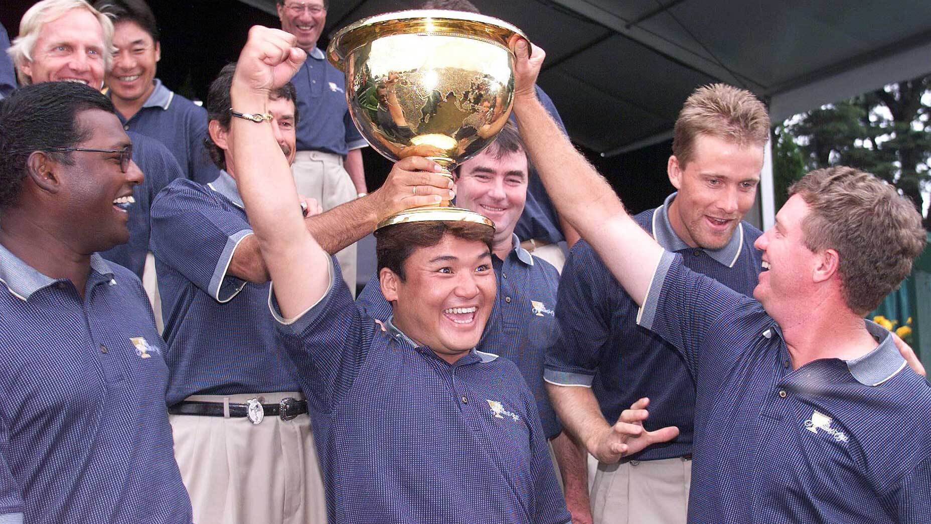 Shigeki Maruyama celebrates winning the president's trophy