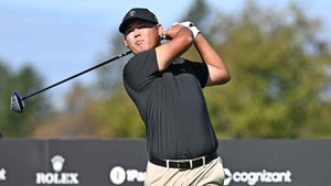 Si Woo Kim of the International Team plays his shot from the ninth tee prior to the 2024 Presidents Cup at The Royal Montreal Golf Club on September 24, 2024 in Montreal, Quebec.