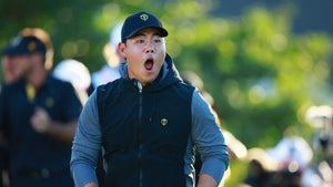 tom kim screams at the Presidents Cup in a black hoodie in Montreal