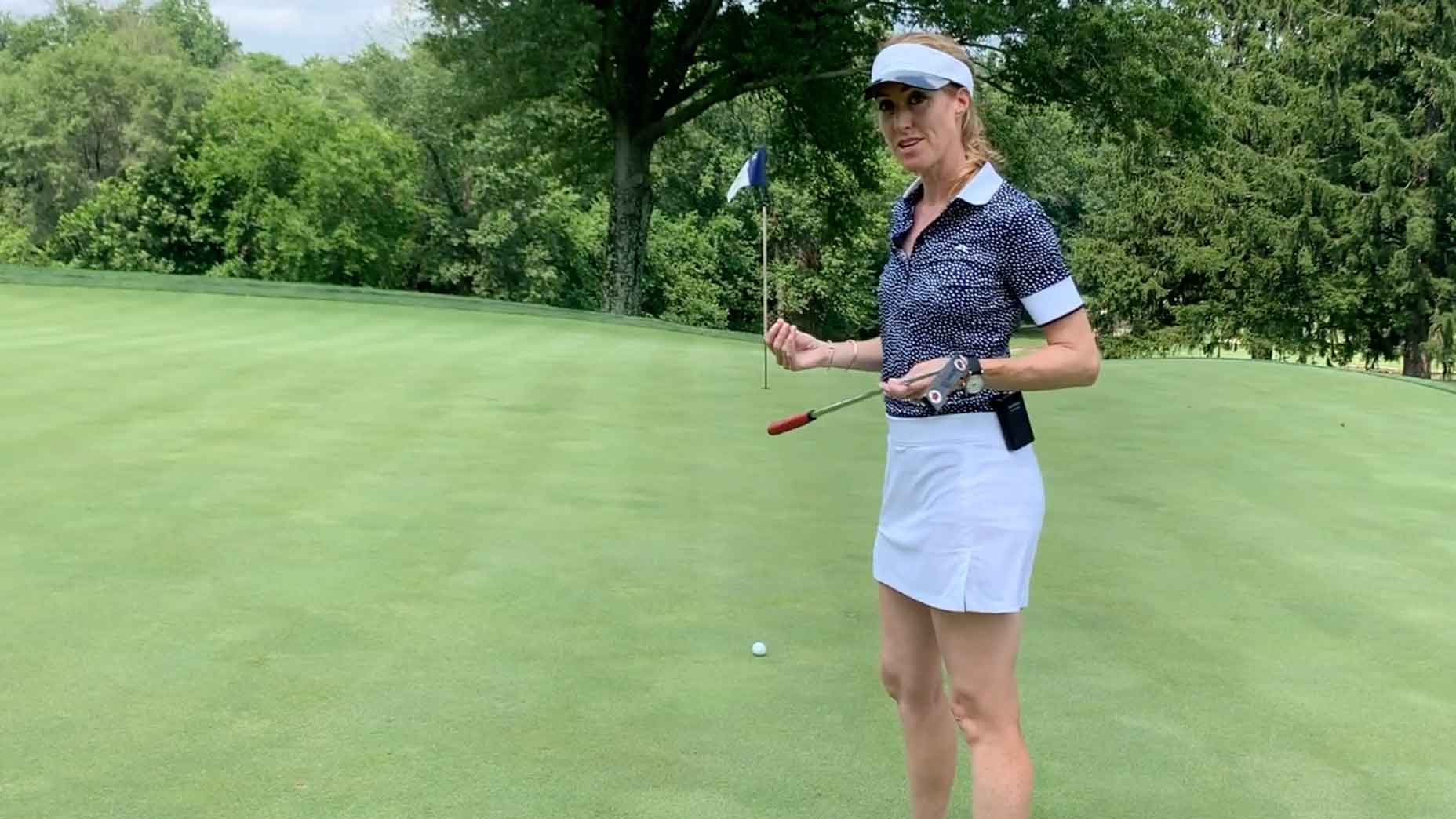 Trillium Rose demonstrates how to read a lag putt properly