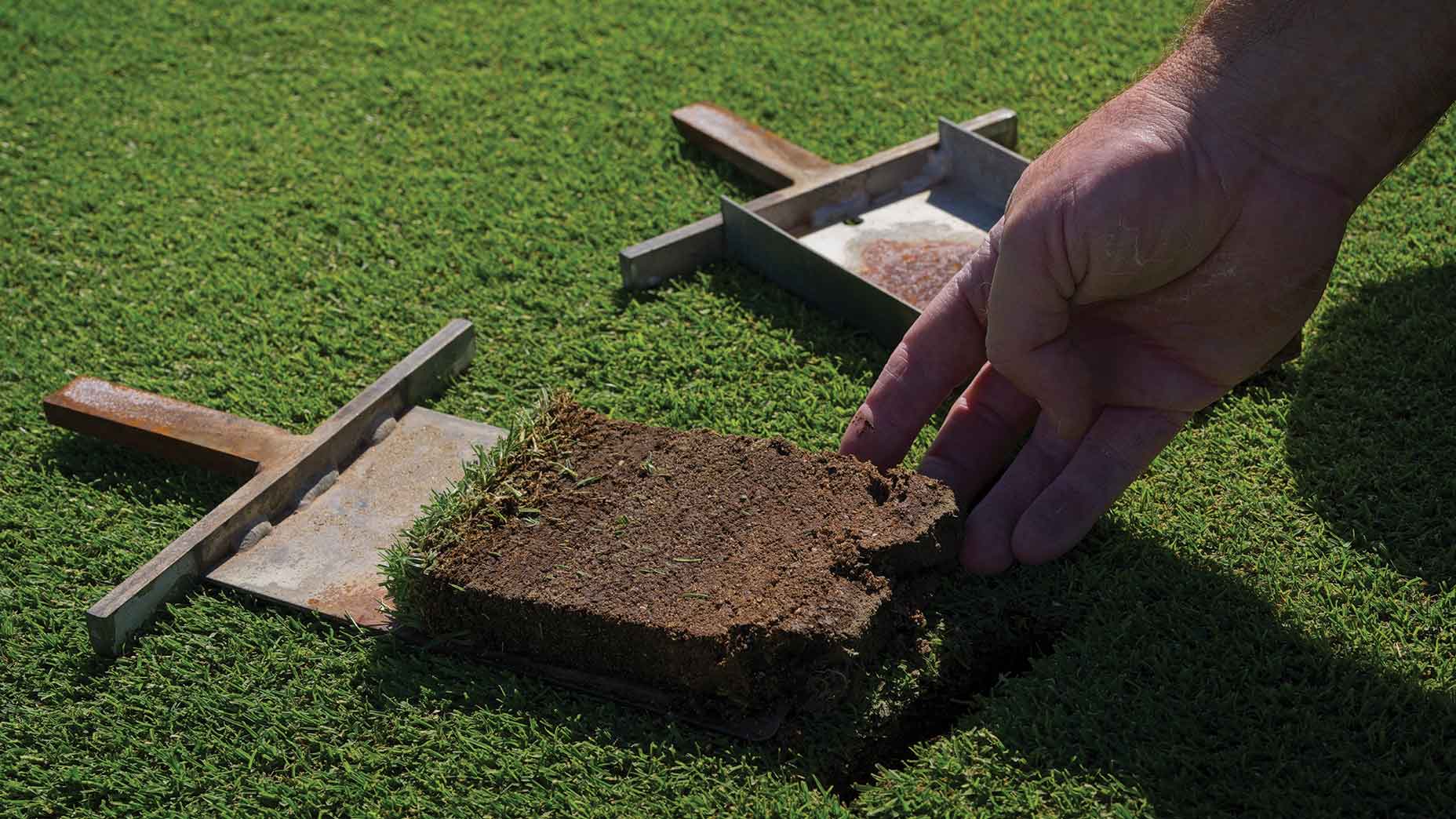 Jeff Goren, Director of Golf Course Operations, takes a soil sample at the ninth fairway, at The Mirabel Club in Scottsdale, Arizona on Friday, June 14, 2024.