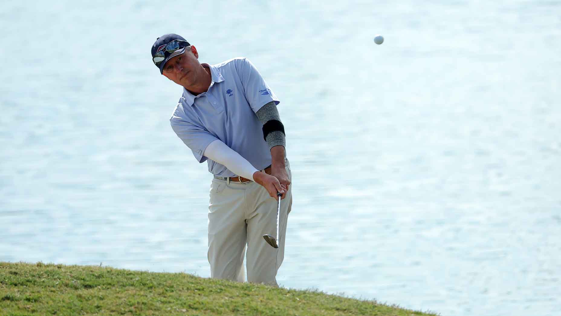 Jason Caron chips onto the 18th green during the first round of the Simmons Bank Championship 2024 at Pleasant Valley Country Club on October 25, 2024 in Little Rock, Arkansas.