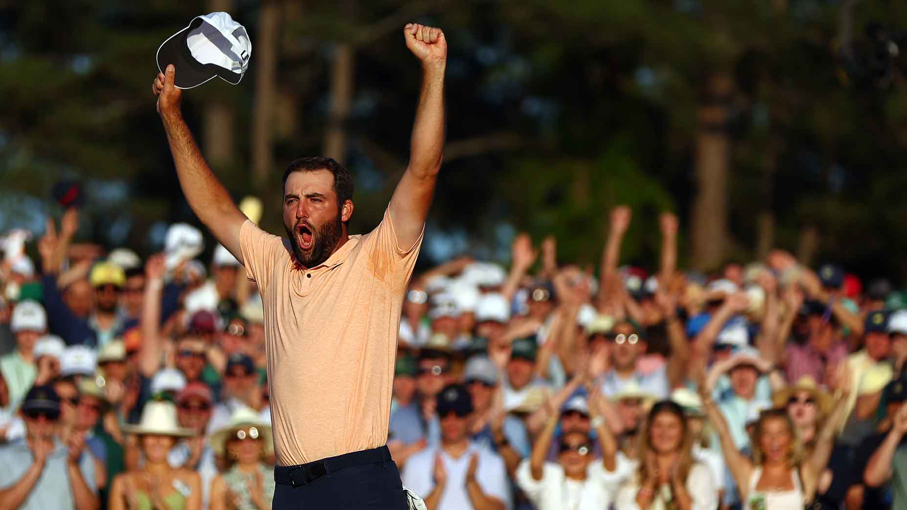 Scottie Scheffler of the United States celebrates on the 18th green after winning the 2024 Masters tournament at Augusta National Golf Club on April 14, 2024 in Augusta, Georgia.