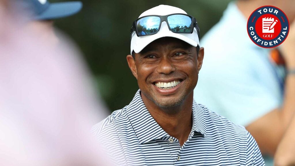 Tiger Woods smiles at the U.S. Junior Amateur.