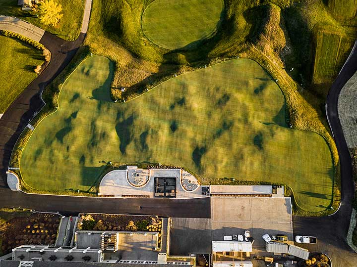 aerial view of geneva national's dance floor sets green