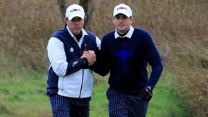 Phil Mickelson celebrates with Keegan Bradley during the 2014 Ryder Cup on the PGA Centenary course at the Gleneagles Hotel.