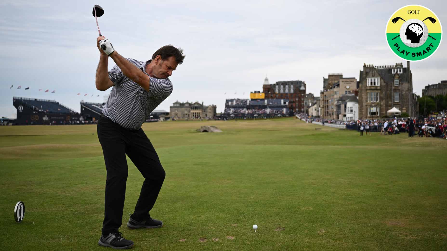 nick faldo hits a tee shot on the 18th hole of the old course