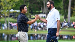 scottie scheffler and tom kim shake hands during the 2024 presidents cup