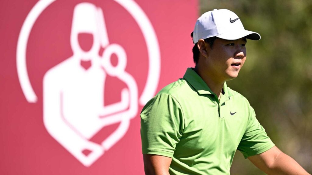 PGA Tour pro Tom Kim prepares to play his shot from the 13th tee prior to the 2024 Shriners Children's Open at TPC Summerlin.