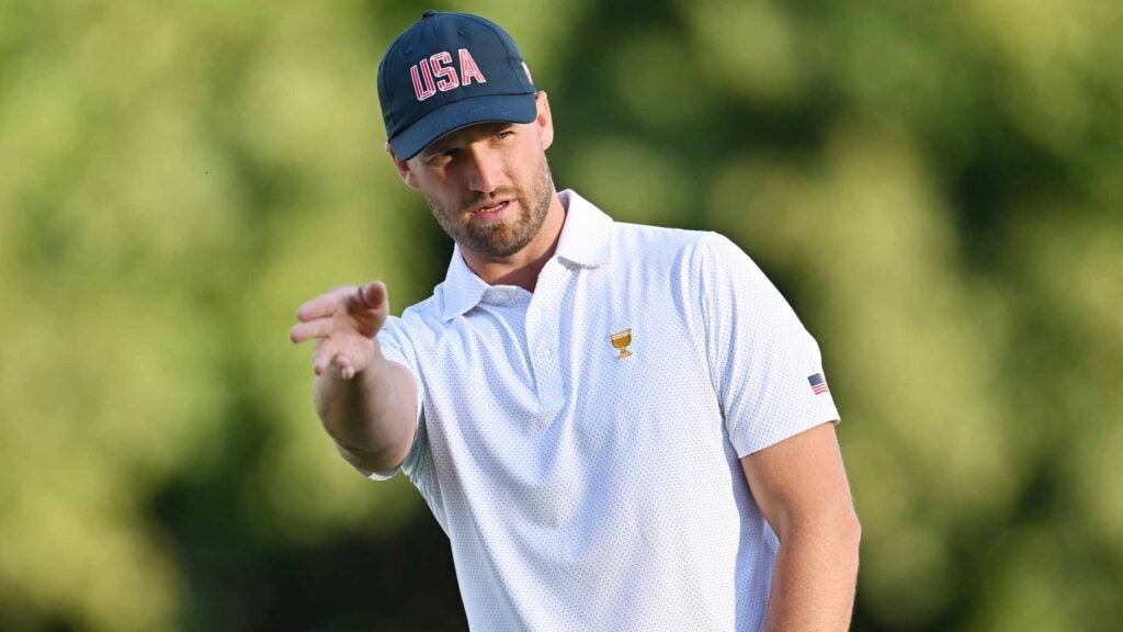 Pro golfer Wyndham Clark of gestures on the 17th green during Thursday's Four-ball matches on day one of the 2024 Presidents Cup at Royal Montreal Golf Club.