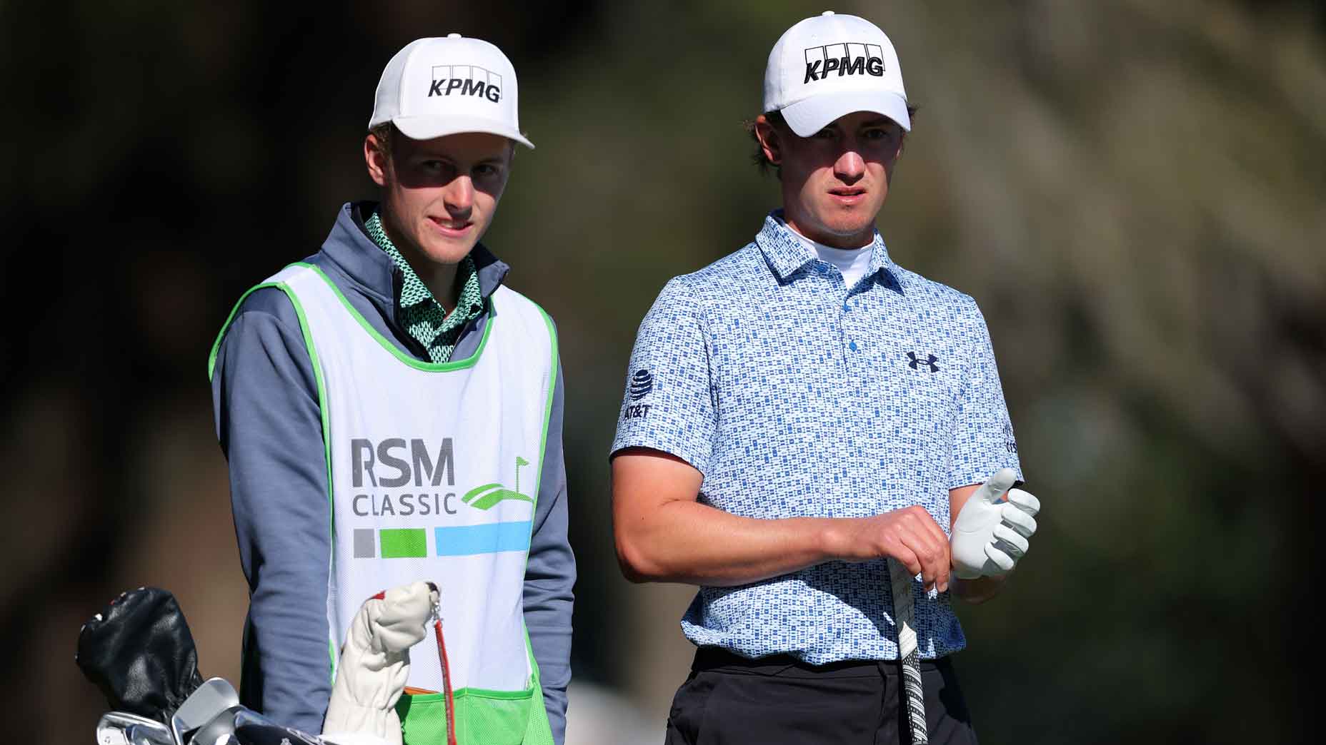 Maverick McNealy of the United States and his caddie look on from the 18th tee during the second round of The RSM Classic 2024 on the Plantation course at Sea Island Resort on November 22, 2024 in St Simons Island, Georgia.