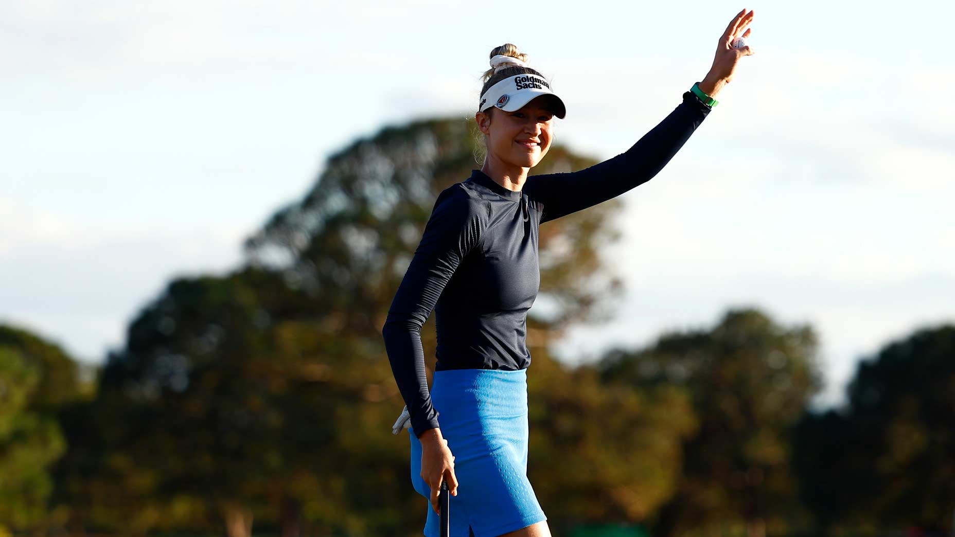 Nelly Korda waves to the crowd at the Annika.