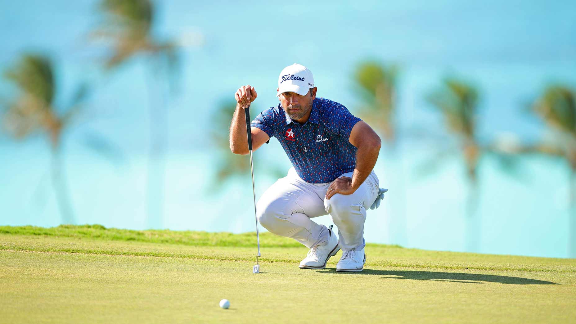 Rafael Campos lines up a putt in Bermuda.