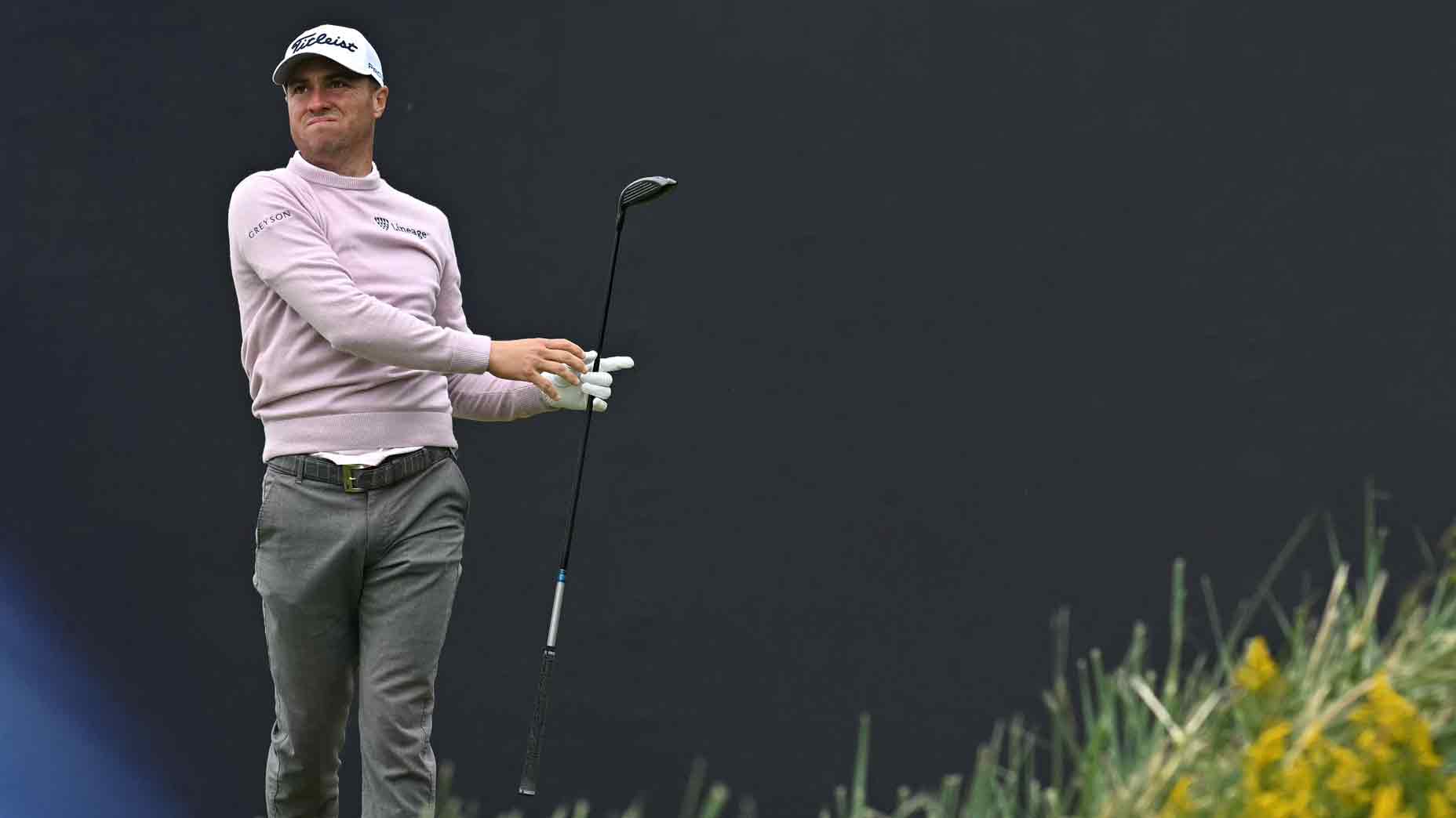 PGA Tour pro watches drive during event.