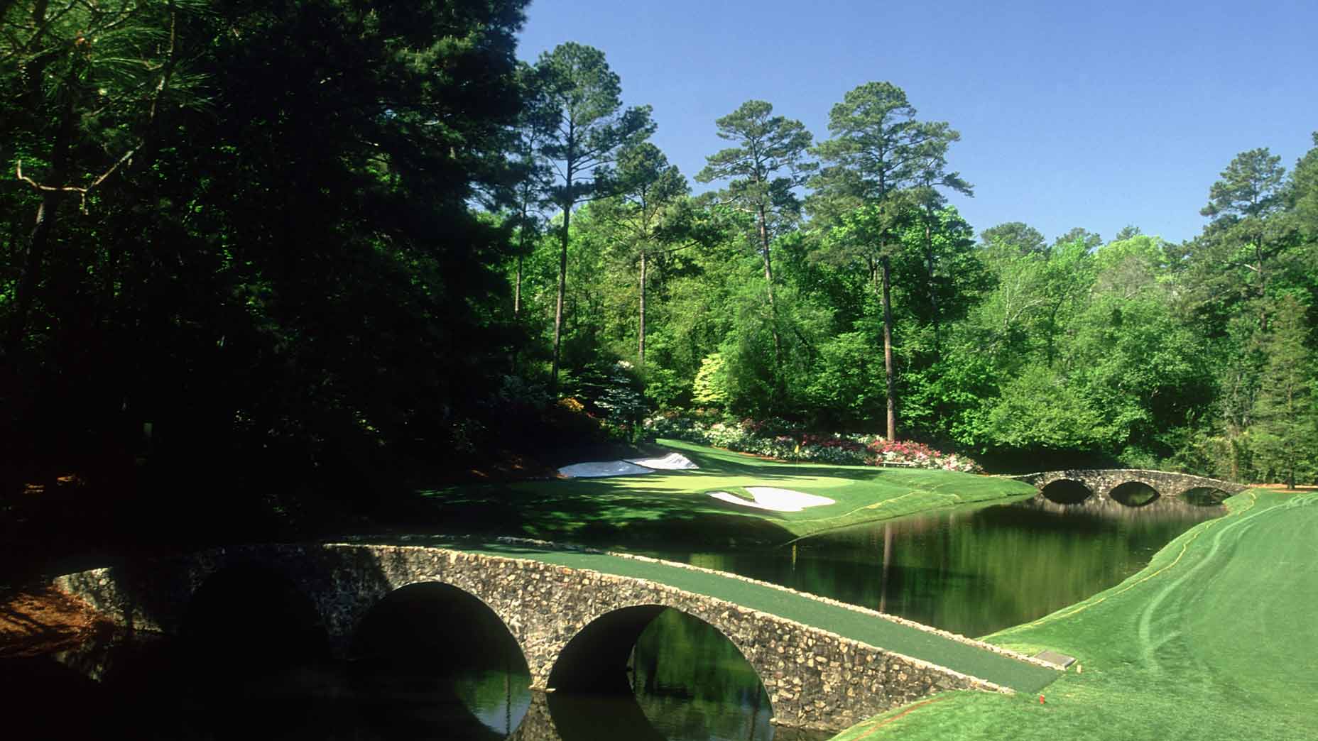 view across water of augusta national's 12th green