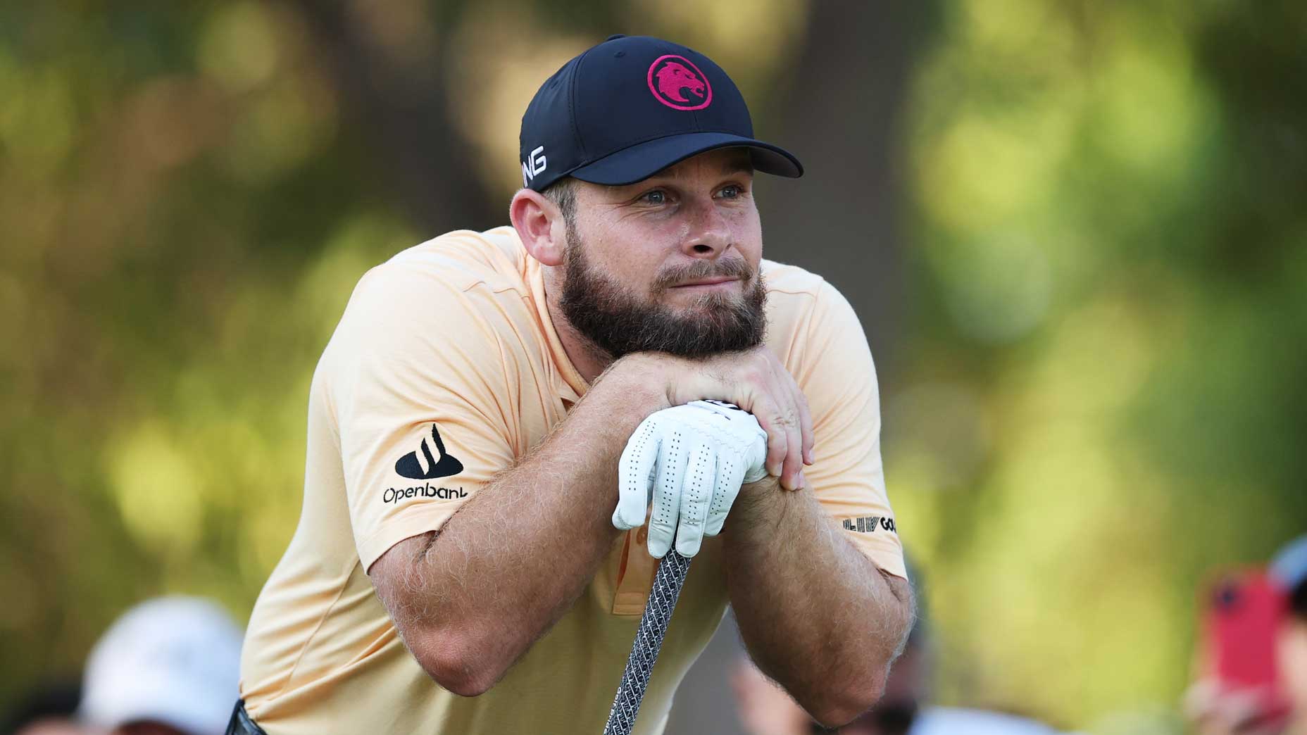 LIV Golf pro Tyrrell Hatton squats on golf course