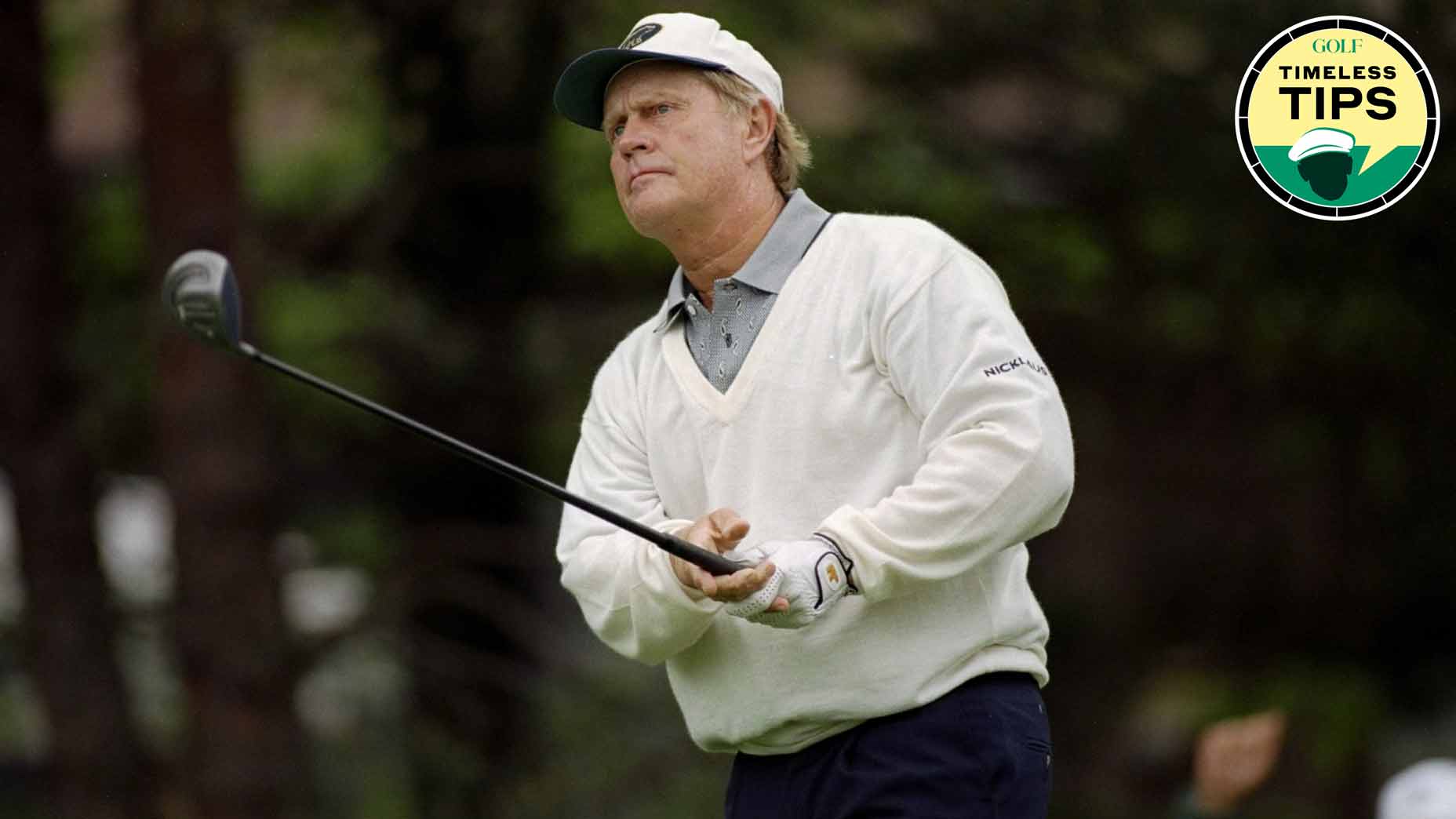 pro golfer jack nicklaus watches his ball after hitting a drive