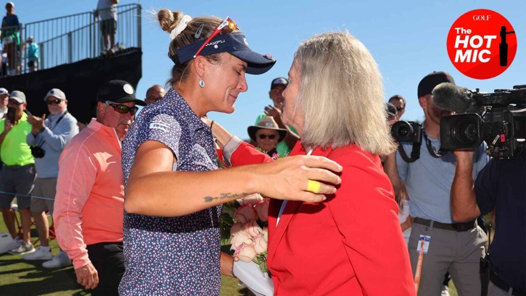 lexi thompson hugs molly marcoux samaan off the 9th green at the CME Group Tour Championship.