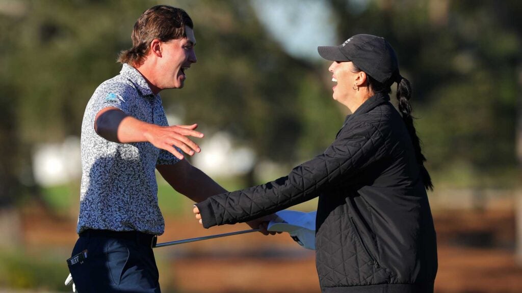 PGA Tour pro Maverick McNealy celebrates with wife Maya Daniels after winning The RSM Classic 2024 at Sea Island Resort.