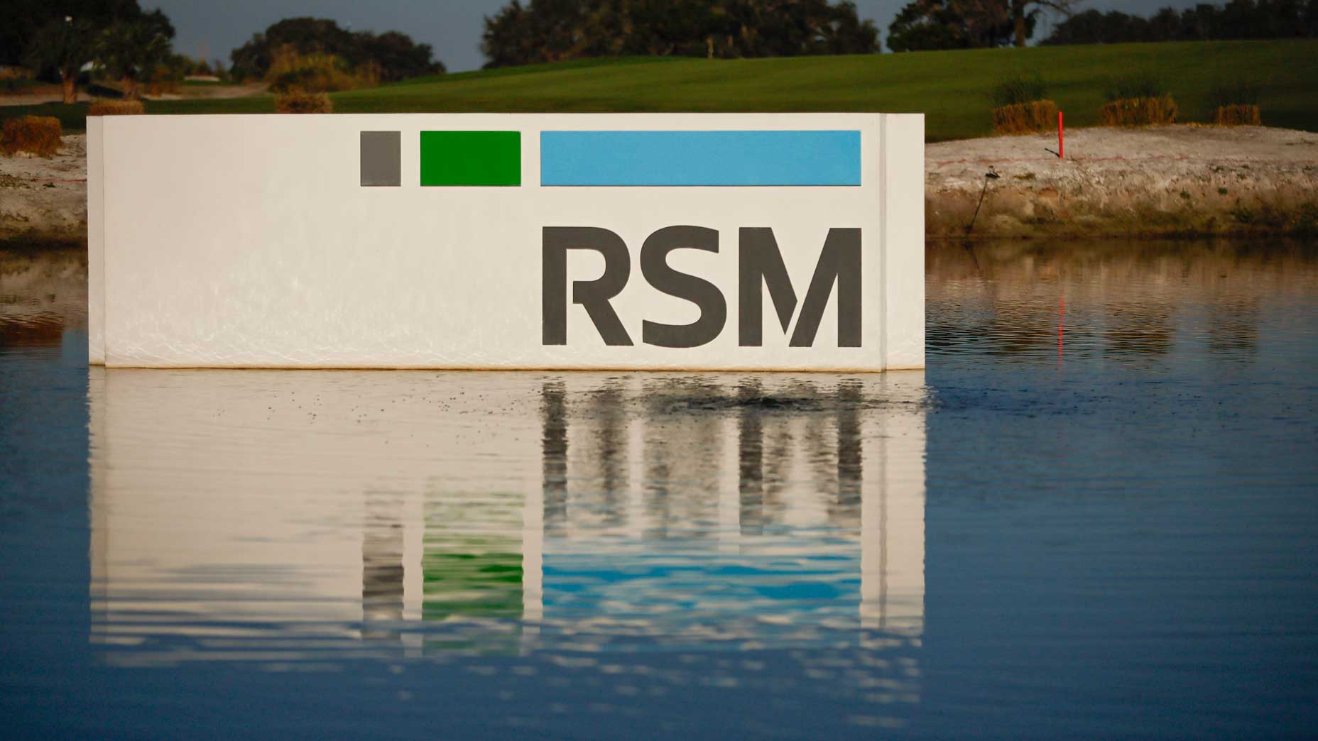 RSM Classic signage in a pond on the course during the final round of The RSM Classic on the Seaside Course at Sea Island Resort on November 19, 2023 in St Simons Island, Georgia.