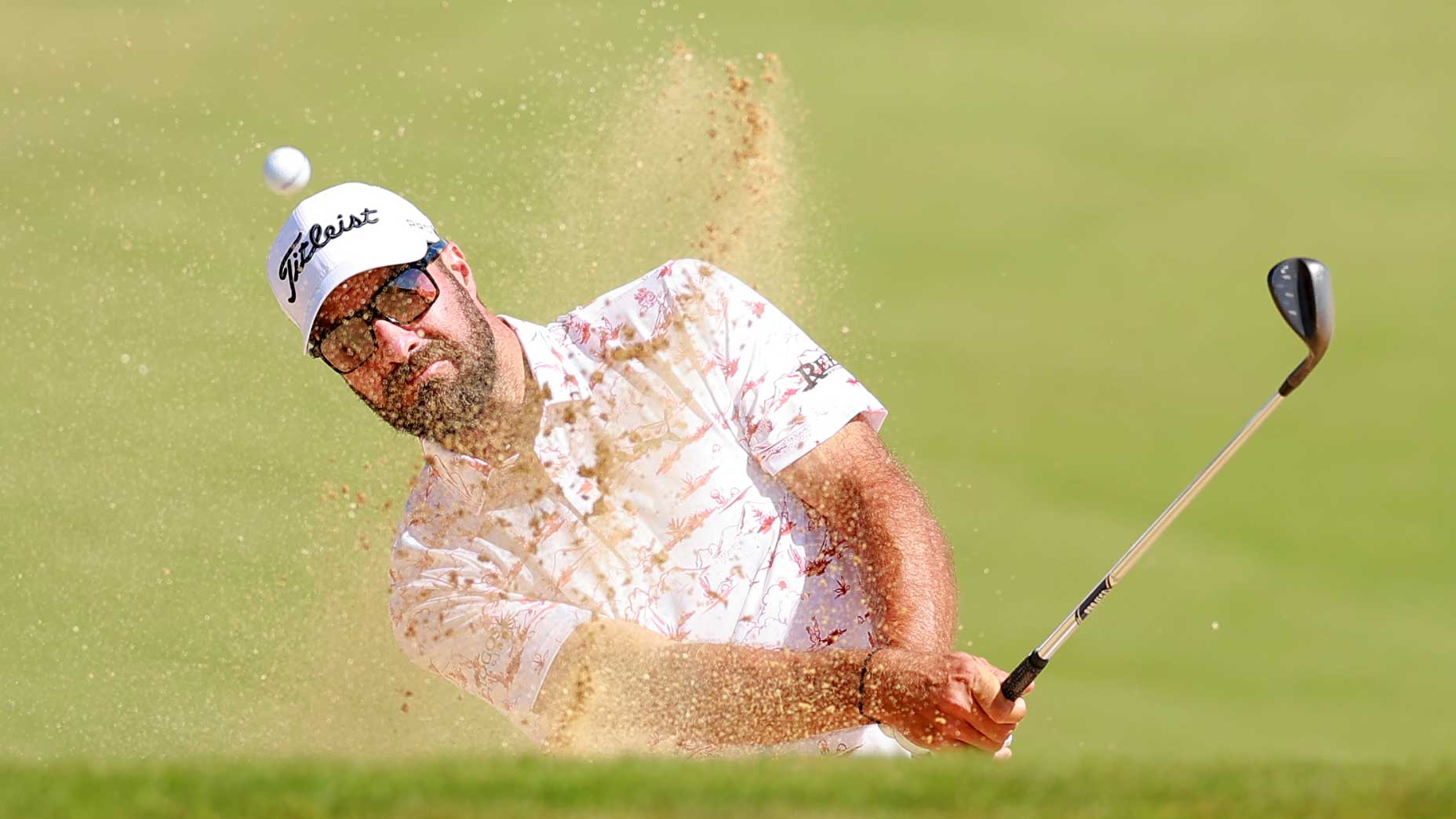 Pro golfer Tom Whitney plays a shot from a bunker on the 11th hole during the first round of the World Wide Technology Championship 2024 at El Cardonal at Diamante on November 07, 2024 in Cabo San Lucas, Mexico.