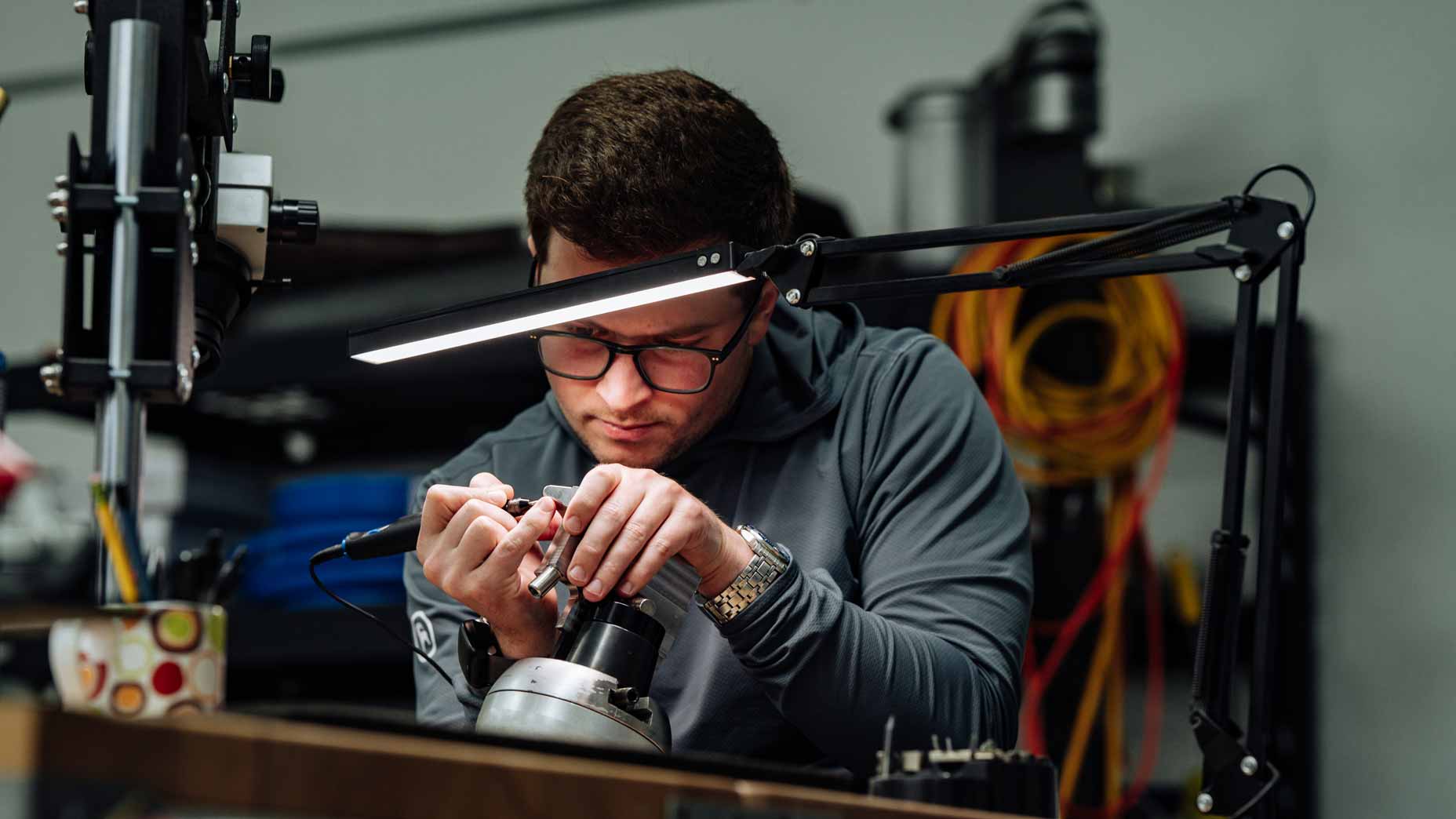 Putter manufacturer Logan Olson working on a putter.