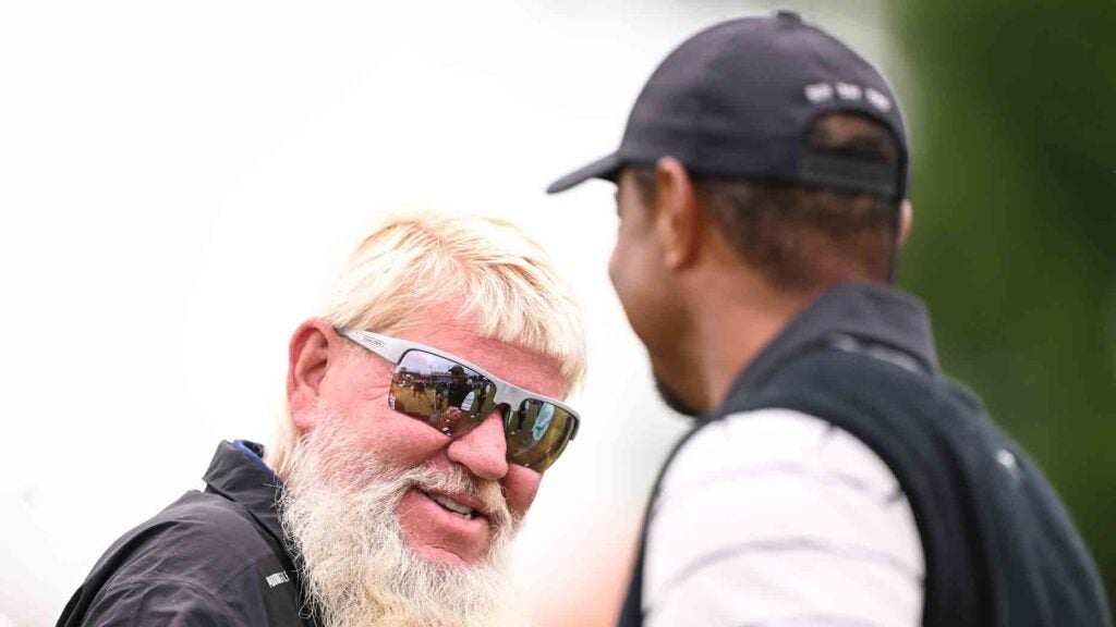 Tiger Woods greets John Daly at PNC — and they talk ‘3-letter words’