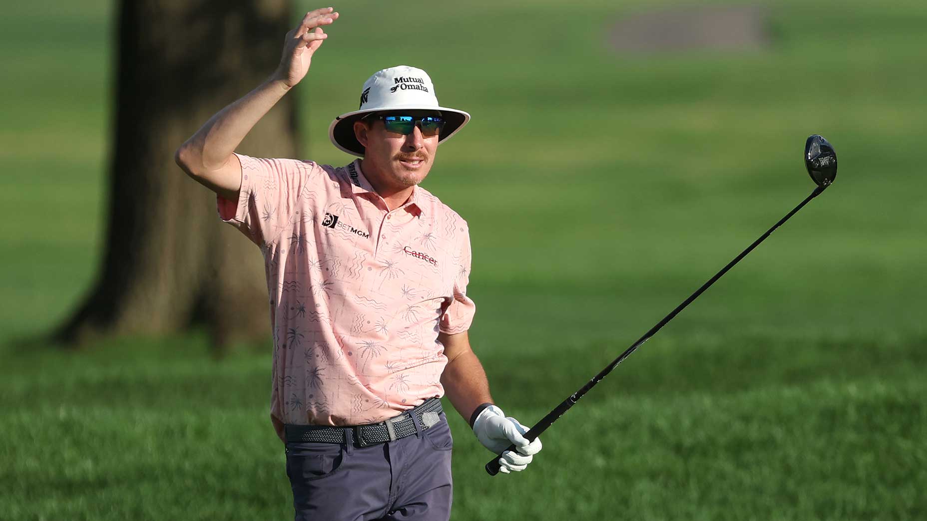 Joel dahmen watches a tee shot