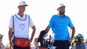 World No. 1 Scottie Scheffler and caddie Ted Scott look on from the 14th tee during the final round of the Hero World Challenge at Albany Golf Course.