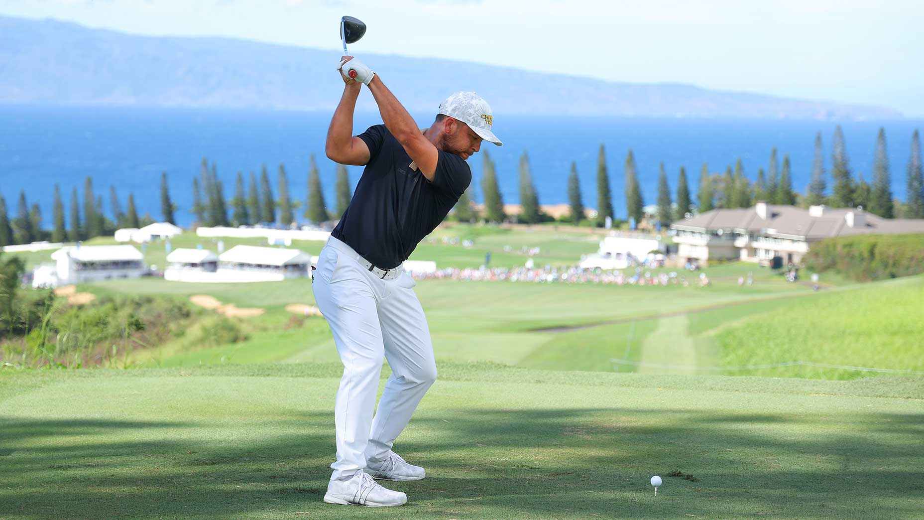 Xander Schauffele tees off during the final round of the 2024 Sentry at the Plantation Course at Kapalua Golf Club in Kapalua, Hawaii.