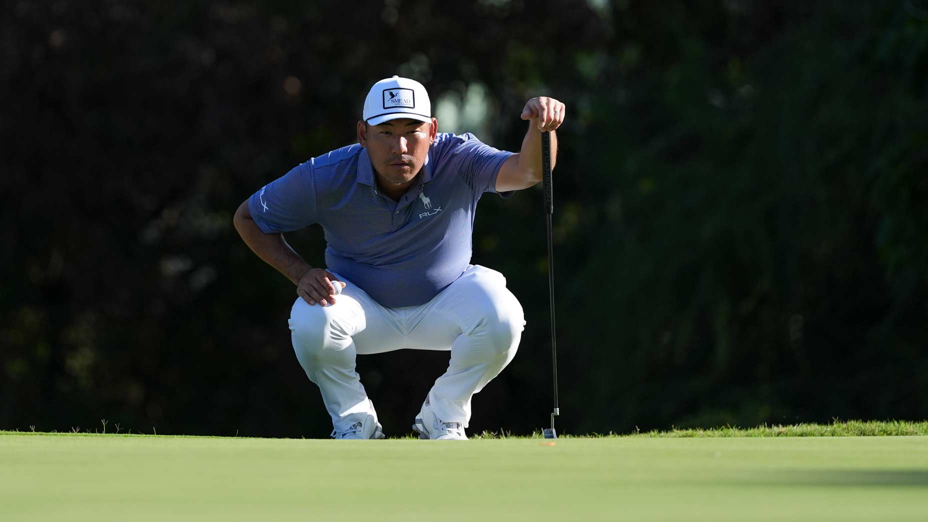 Chan Kim lines up a putt at the Sony Open.