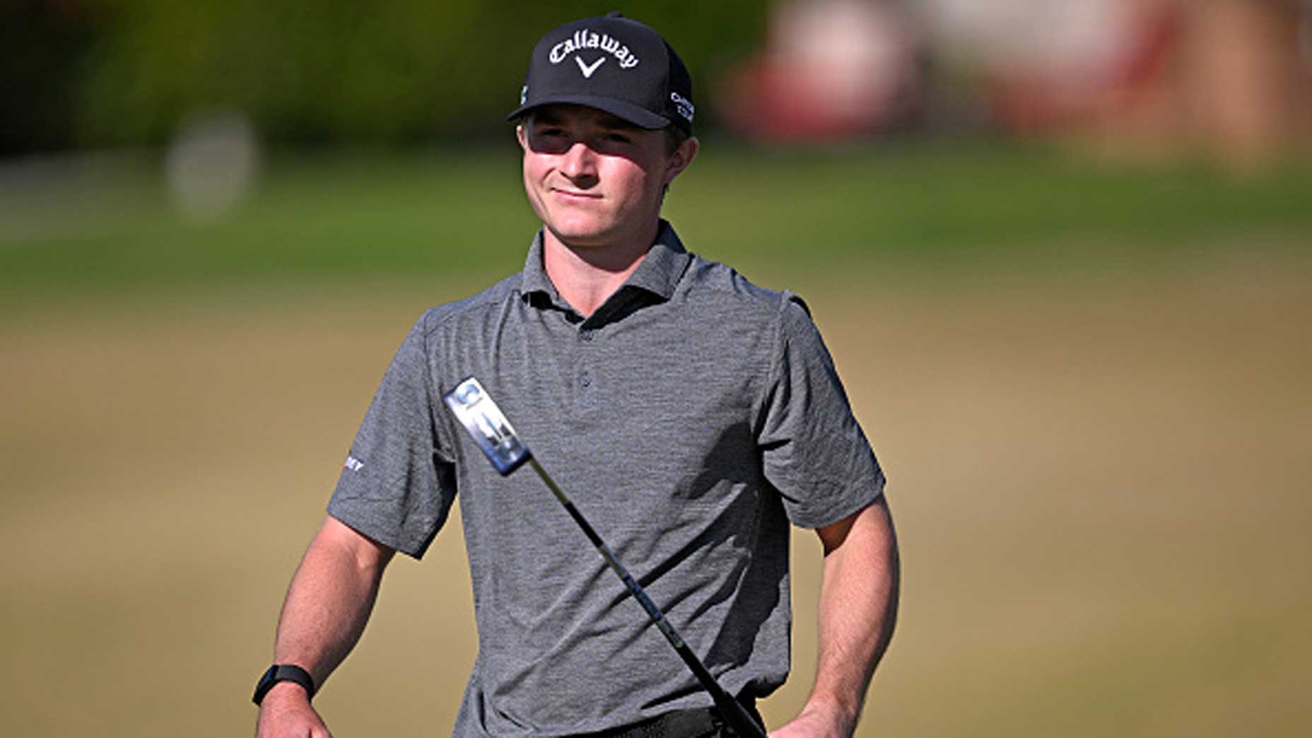 Blades Brown of the United States reacts to a putt