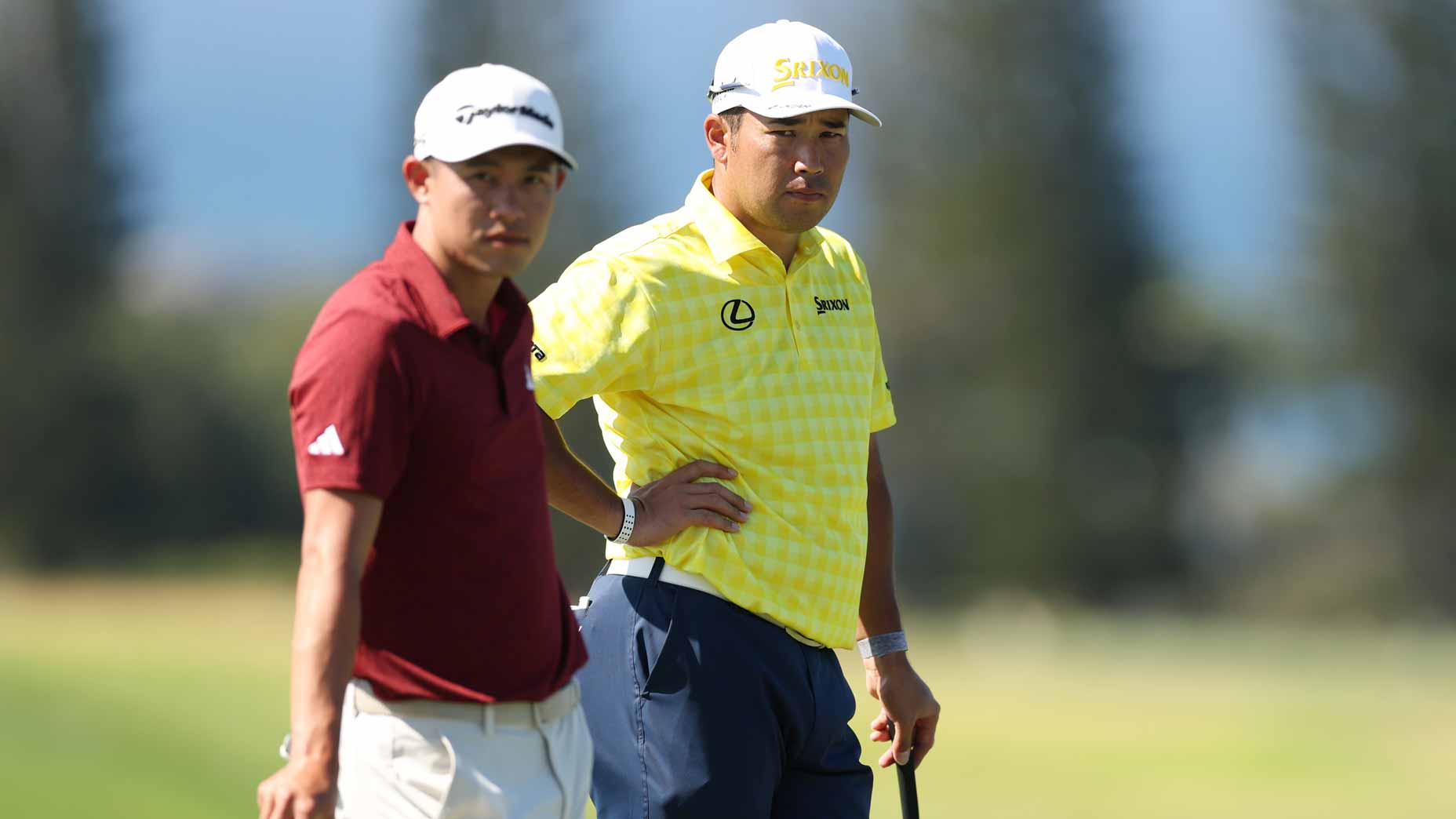 Collin Morikawa of the United States and Hideki Matsuyama of Japan stand on the ninth green during the final round of The Sentry 2025 at Plantation Course at Kapalua Golf Club on January 05, 2025 in Kapalua, Hawaii.