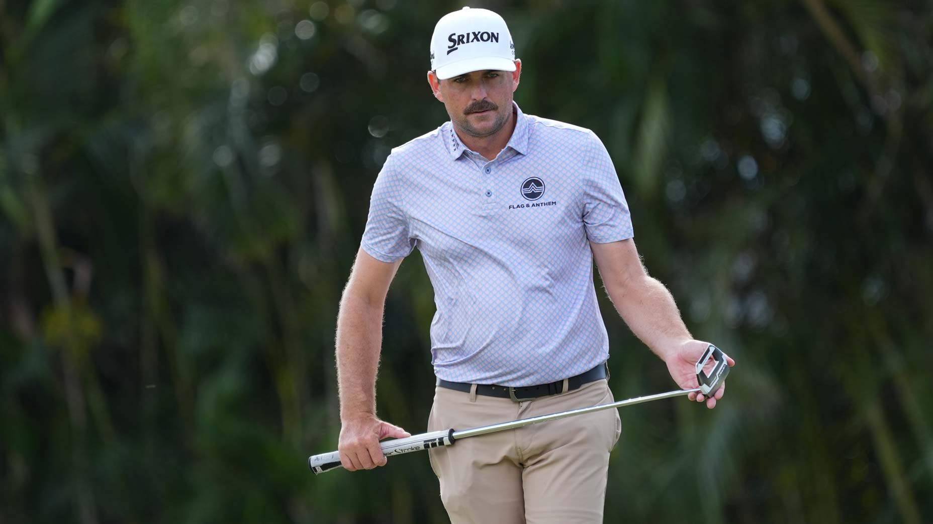 Keegan Bradley looks at a putt at the Sony Open.