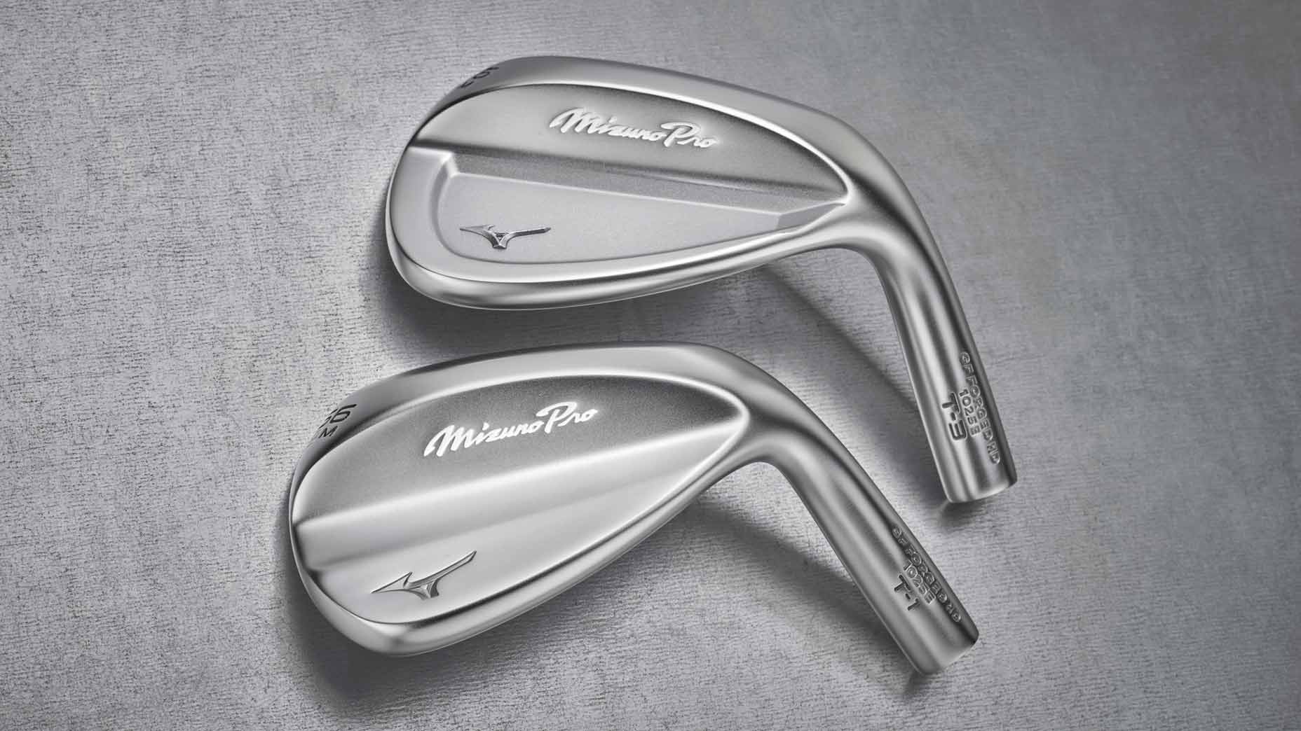 New Mizuno Pro T-1 and T-3 wedges agqainst a grey background.