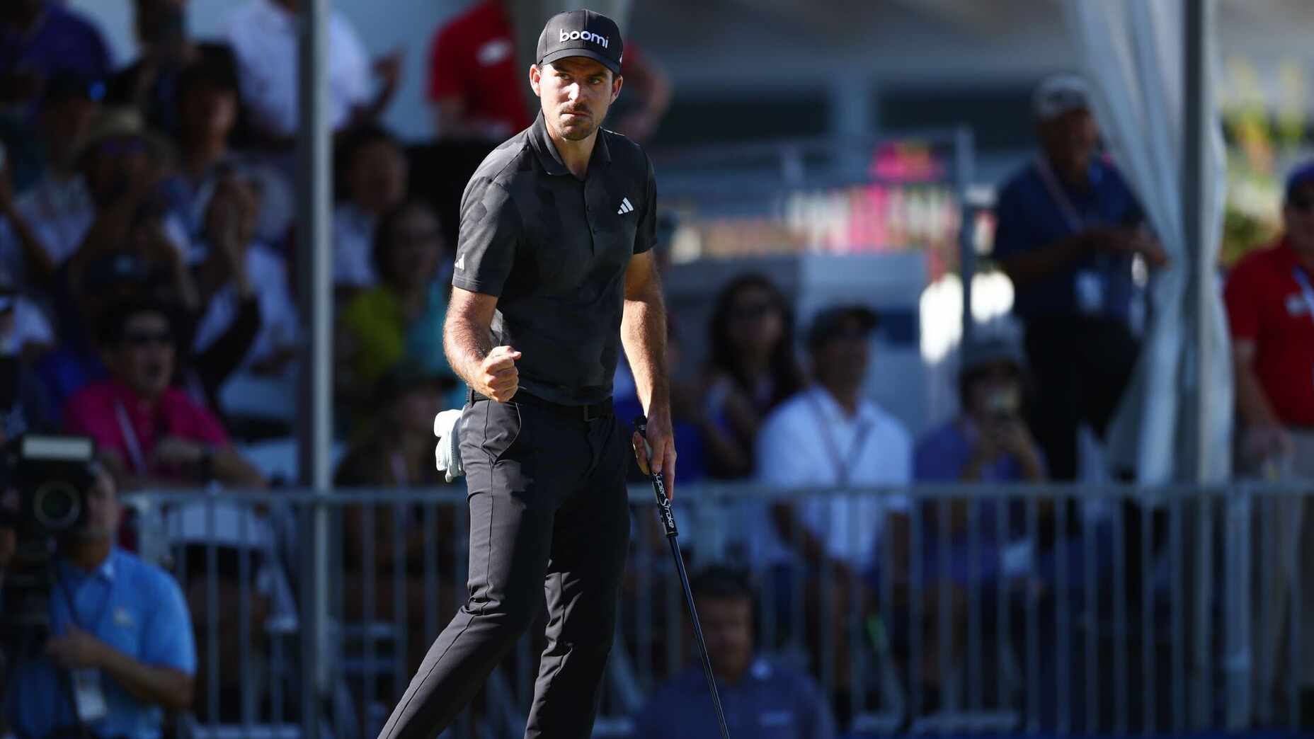 PGA Tour golfer Nick Taylor reacts to winning the Sony Open in a playoff.