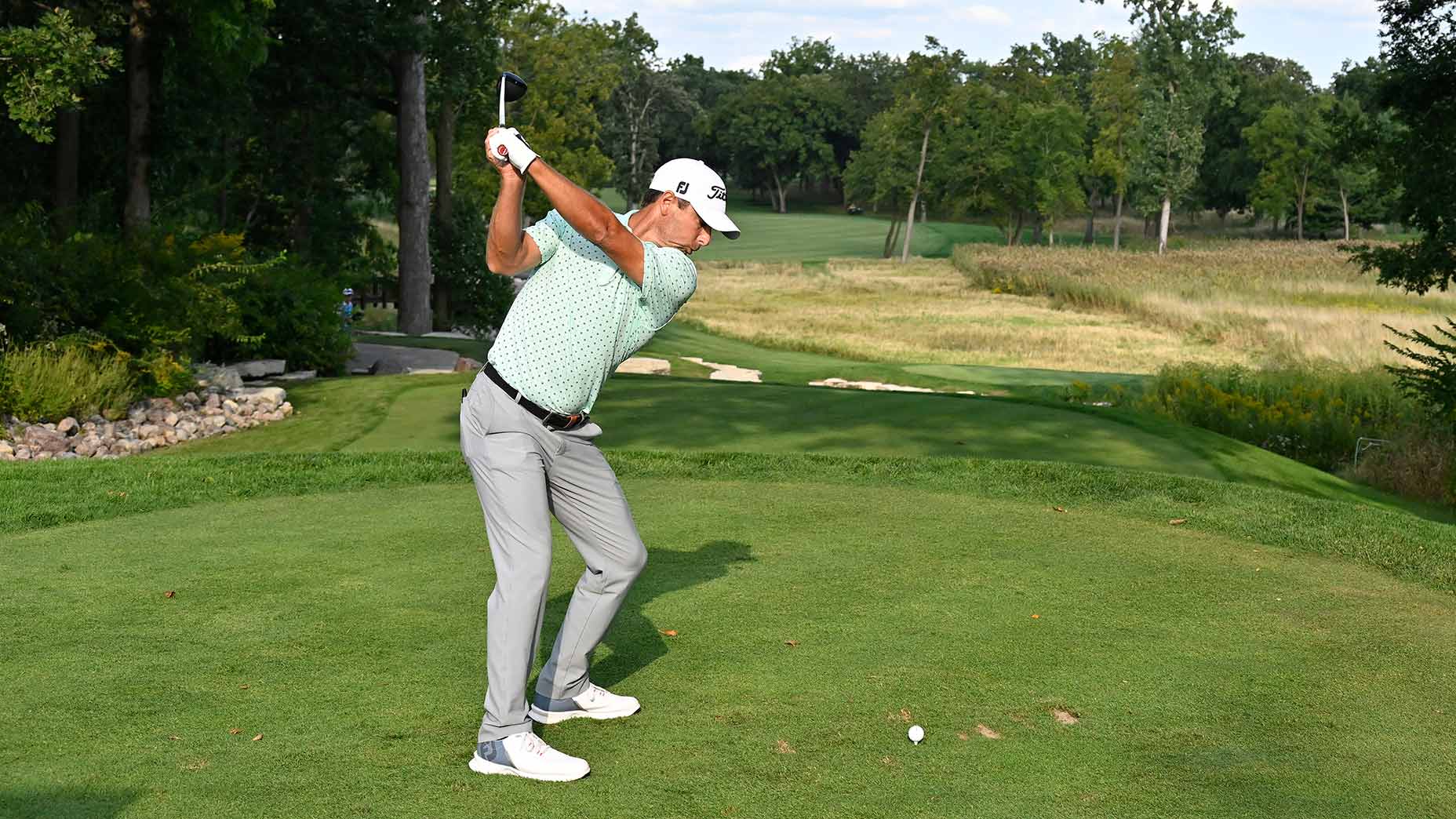 Charles Howell III hits a tee shot during a 2022 LIV Golf event at Rich Harvest Farms in Sugar Grove, Ill.