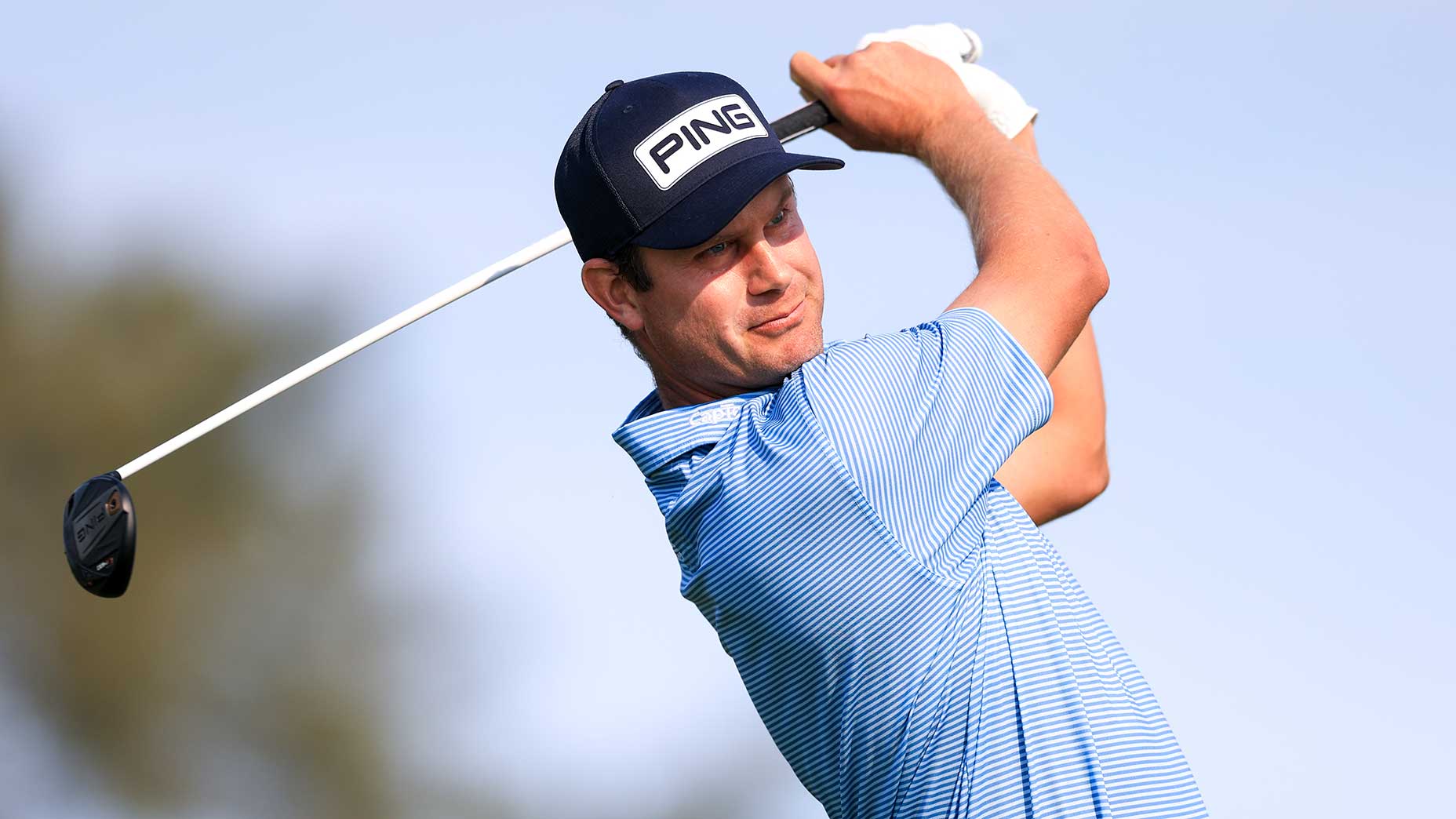 Harris English hits a tee shot on the second hole during the third round of the Farmers Insurance Open.