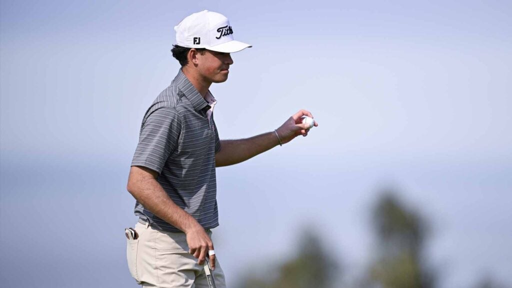 No. 2 ranked amateur Jackson Koivun reacts to a made putt at the Farmers Insurance Open