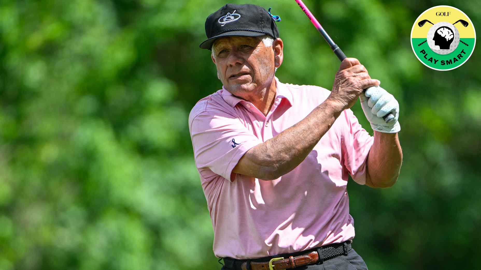 Lee Trevino swings driver in pink shirt