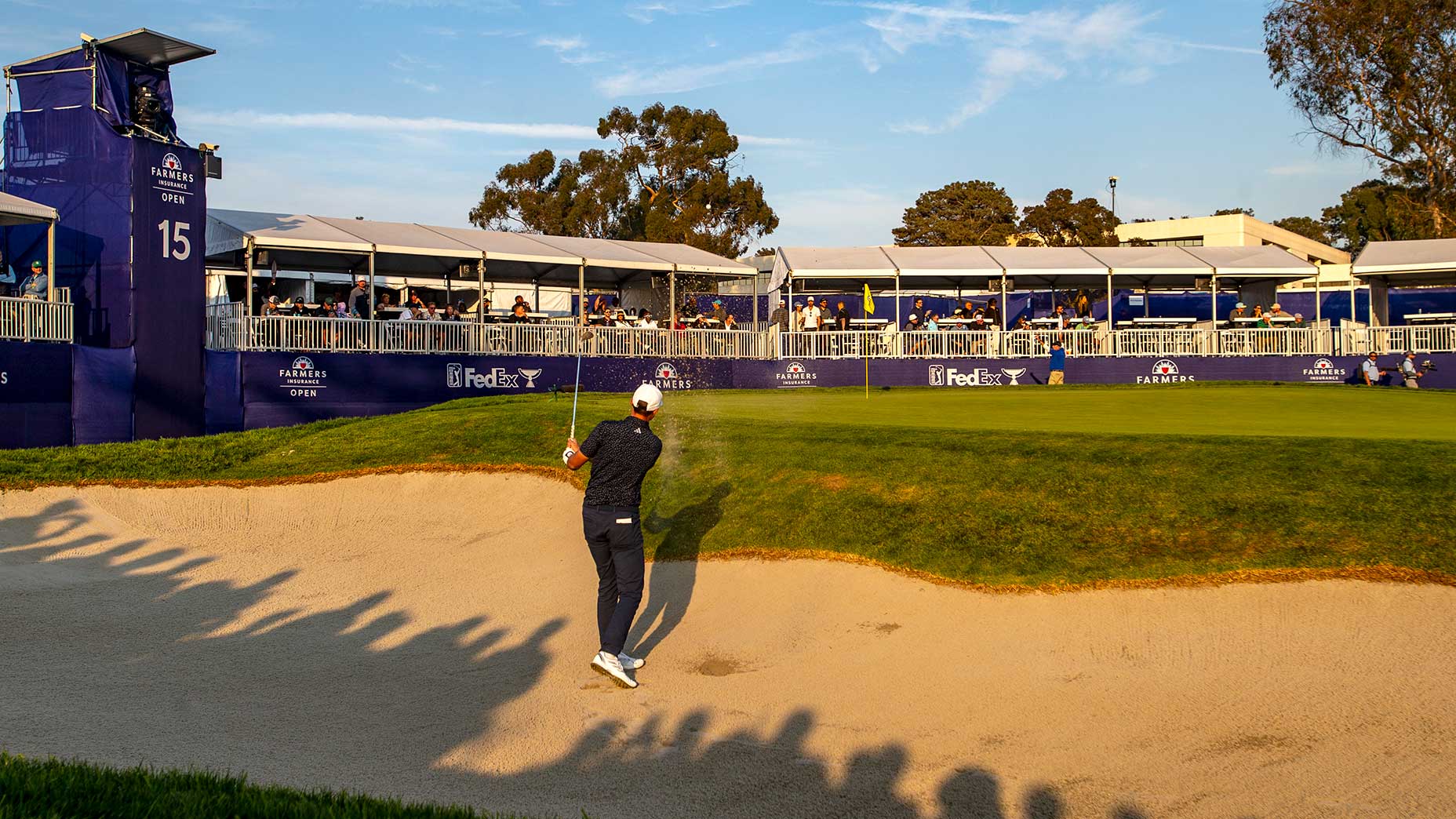 Ludvig Aberg blasts out of a bunker during the third round of the Farmers Insurance Open at Torrey Pines Golf Course in La Jolla, Calif.