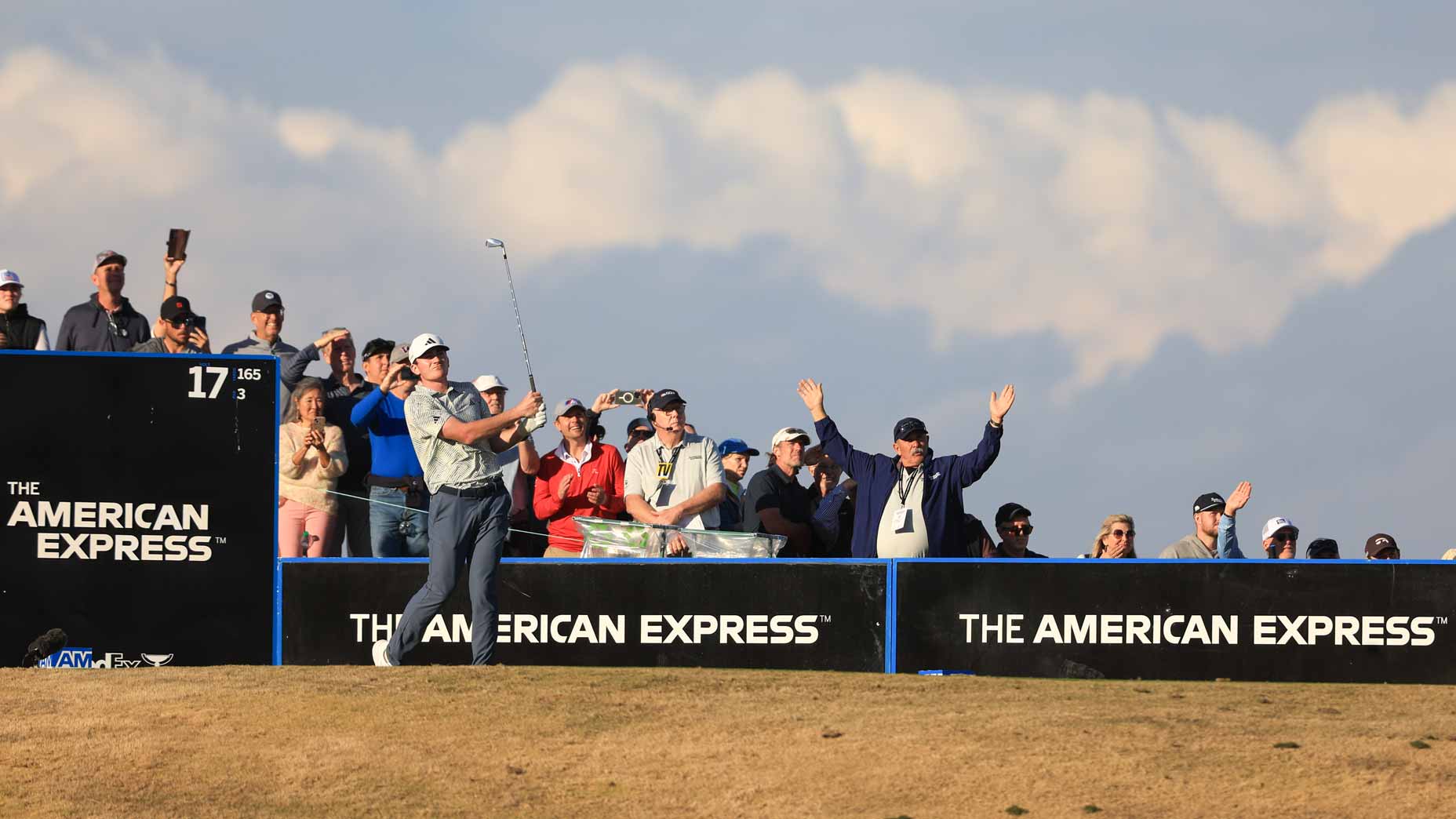 Pro golfer Nick Dunlap hits a tee shot on the 17th hole during the final round of The American Express at Pete Dye Stadium Course.