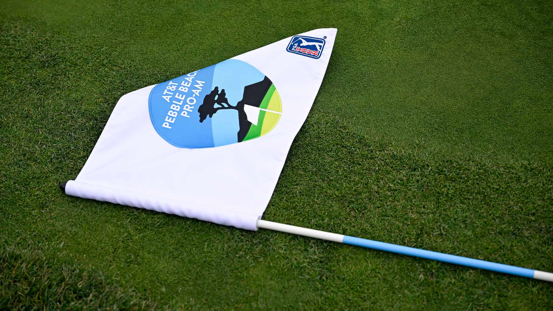 2025 AT&T Pebble Beach Pro-Am flag is seen at Pebble Beach Golf Links on January 29, 2025.