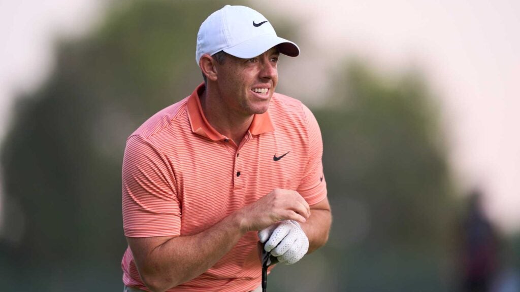 PGA Tour pro Rory McIlroy reacts after his second shot on the 18th hole during the final round of the 2025 Hero Dubai Desert Classic at Emirates Golf Club.