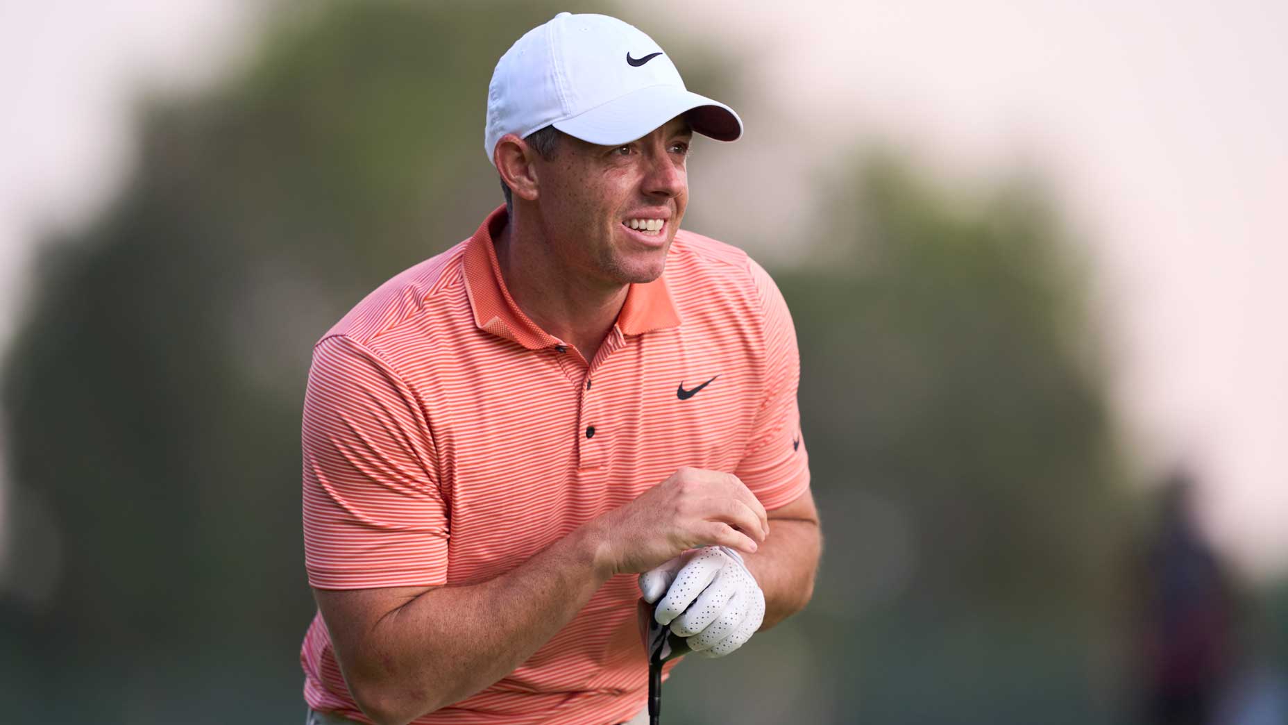 PGA Tour pro Rory McIlroy reacts after his second shot on the 18th hole during the final round of the 2025 Hero Dubai Desert Classic at Emirates Golf Club.