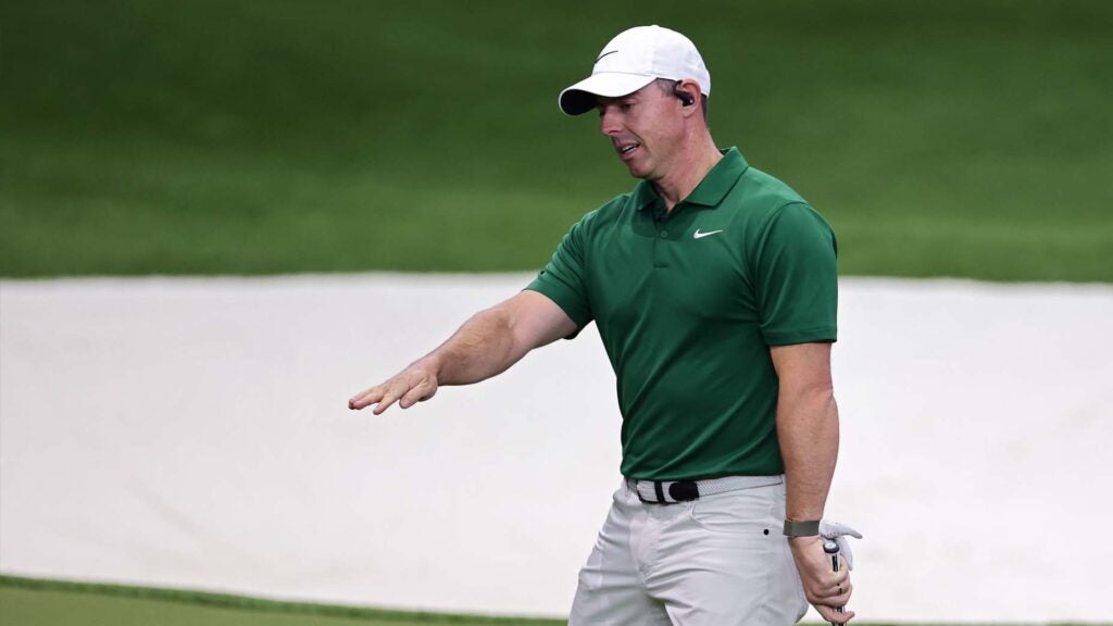 Rory McIlroy reacts to a missed putt during his TGL match.