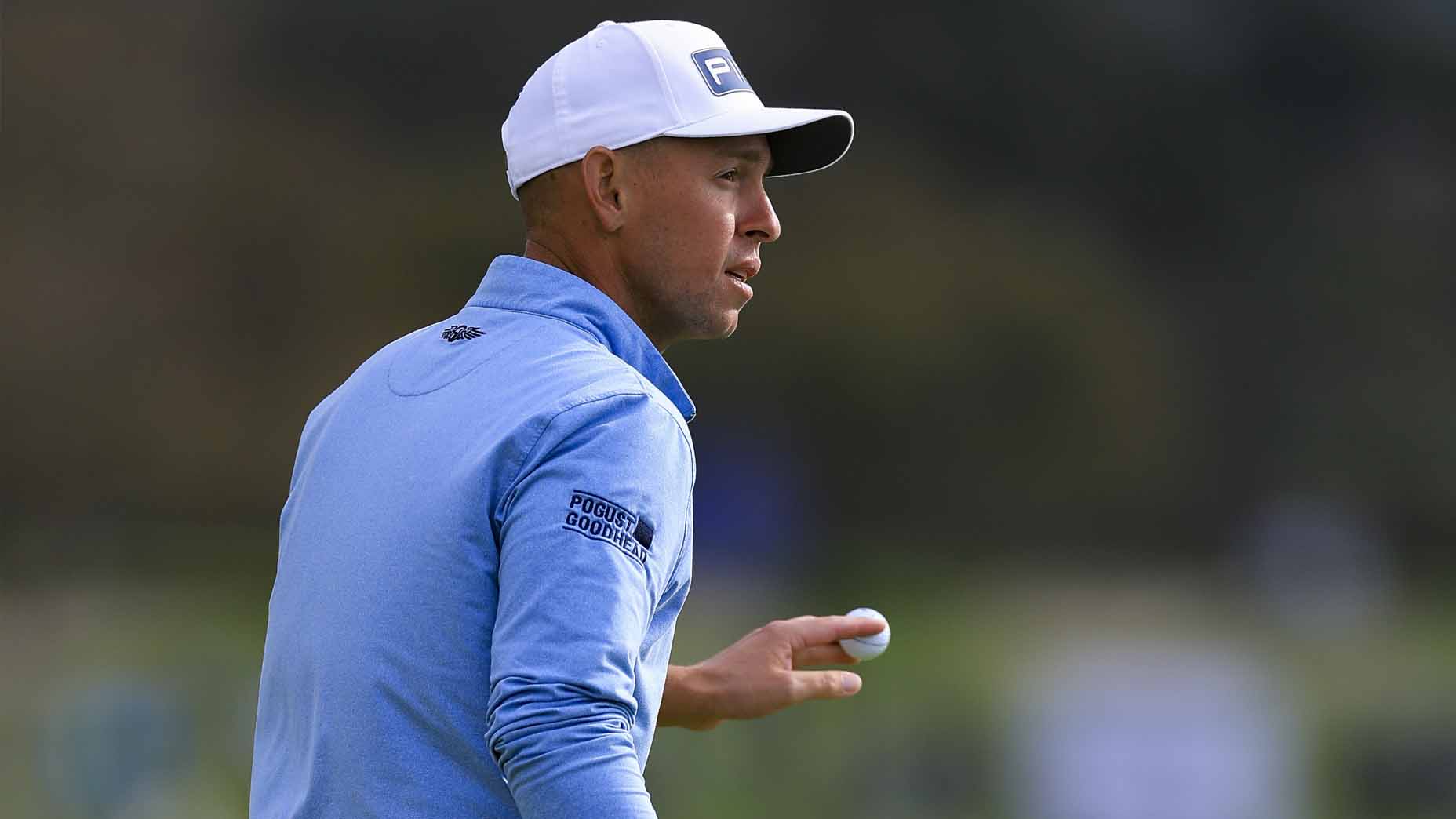 Sam Stevens reacts to a made putt during the final round of the Farmers Insurance Open