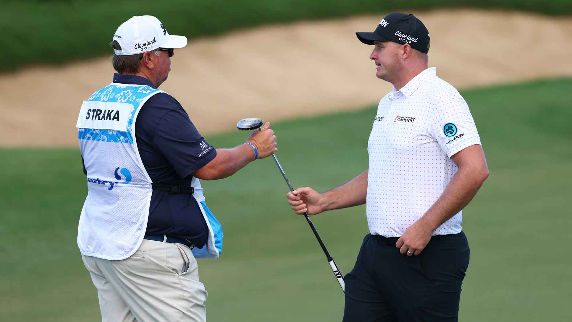 Sepp Straka of Austria hands his club to his caddie on the 12th green during the second round of The Sentry 2025 at Plantation Course at Kapalua Golf Club on January 03, 2025 in Kapalua, Hawaii.