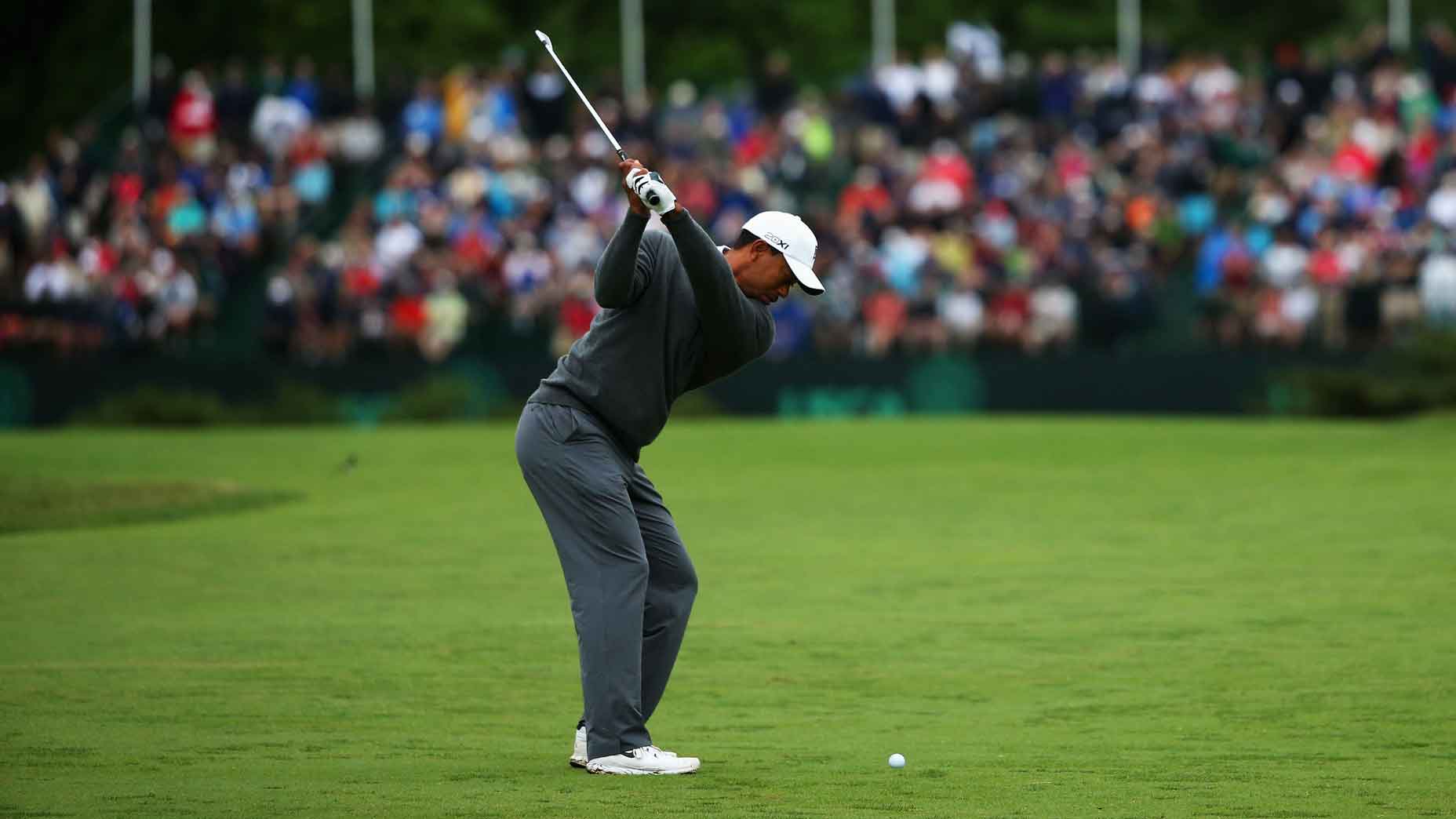 tiger woods swings during the 2013 u.s. open